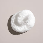 Oribe grandiose hair foam showing clean ingredient and usage label