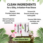 Solid roll-on travel size shaving soap sticks for women and men next to travel toiletries.