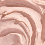 Tree Hut sweet candy inspired whipped shave butter tube being held to demonstrate the authentic product sizing.