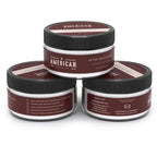 Natural ingredient aftershave cream container with aloe vera and vitamin E elements.