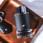 Imported Montblanc Explorer luxury aftershave balm for men isolated on a clean background.