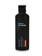 Side profile of Bump Patrol four ounce aftershave solution showing instructions for use