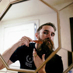 Close up view of the medium firm second cut bristles on the ZEUS travel beard brush