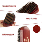 Close up of one hundred percent natural boar bristles on dark walnut wood handle