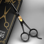 Close up view of the hammer forged high carbon stainless steel blades on the BRV MEN facial hair scissors.