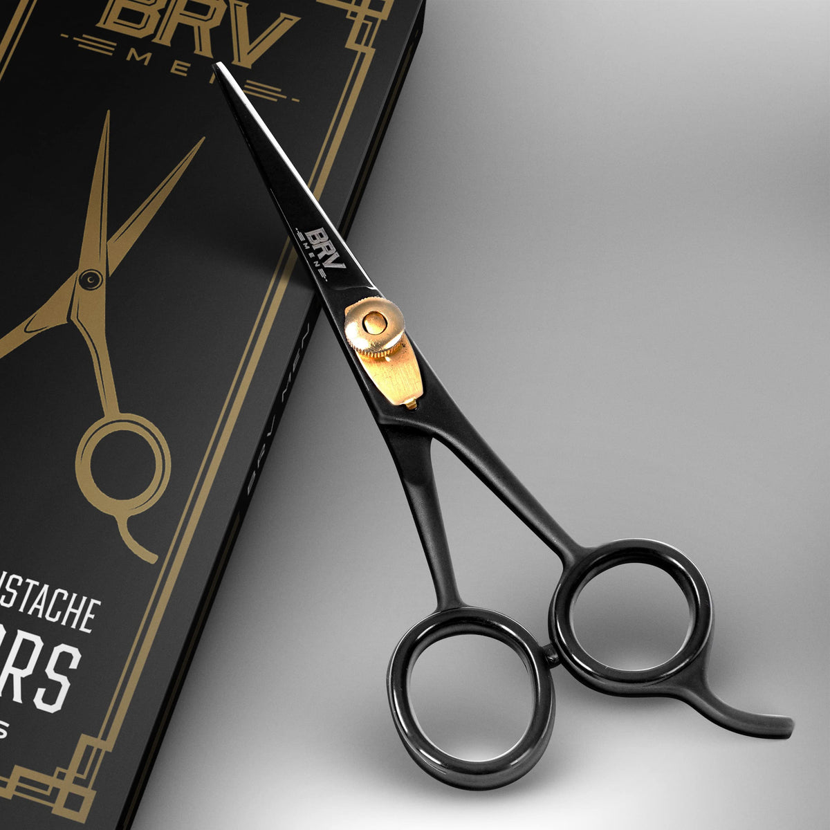 Close up view of the hammer forged high carbon stainless steel blades on the BRV MEN facial hair scissors.