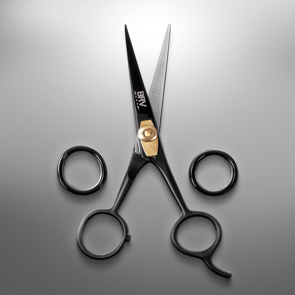 BRV MEN professional grooming shears opened wide to highlight the precise sharp bevel edge.