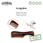 Golden Beards mustache wax tin beside grooming comb