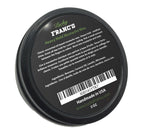 Close up of Lucky Franc's mustache grooming wax texture