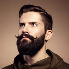 Man grooming facial hair with Lucky Franc's mustache wax