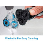 Demonstration of rinsing the waterproof replacement shaver heads under running tap water.