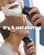 Three pack of Uijino replacement grooming cutters displayed next to the included black nylon cleaning brush.