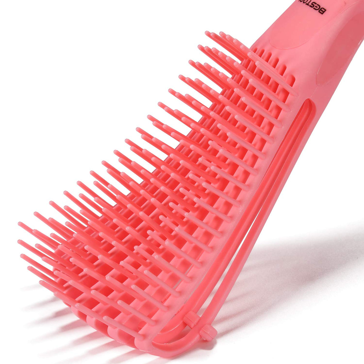 Side profile of the pink BESTOOL hair brush showcasing the flexible arms bending to remove knots.