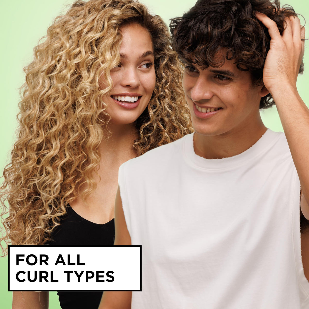 Garnier leave in curly hair moisturizing spray showing the spray nozzle and product texture details