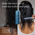 Living Proof multi protection hair detangler spray bottle standing upright on a clean retail display surface