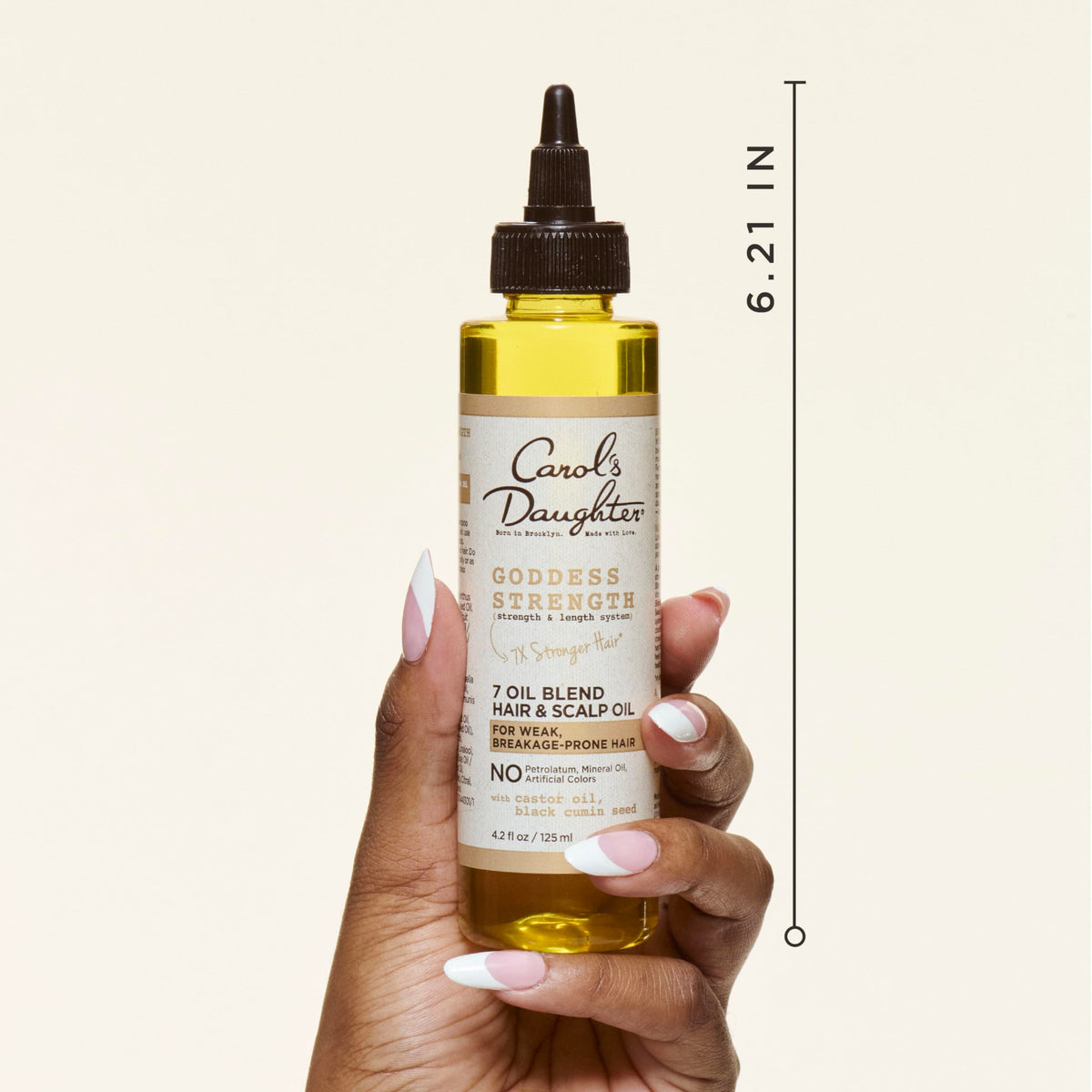 Carol's Daughter scalp and hair treatment with castor oil applicator tip