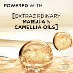 L'Oreal Paris Elvive Extraordinary Oil product texture demonstration showing the clear lightweight liquid.