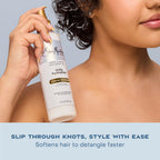 Texture shot of the lightweight milky fluid from the Shea Moisture coconut hair treatment.
