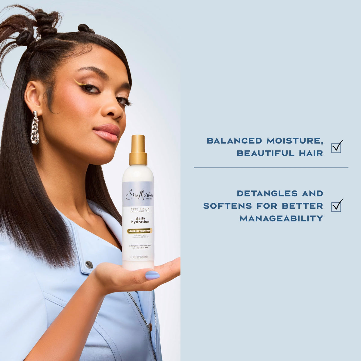 Side view of the Shea Moisture virgin coconut oil daily hydration bottle highlighting product volume.