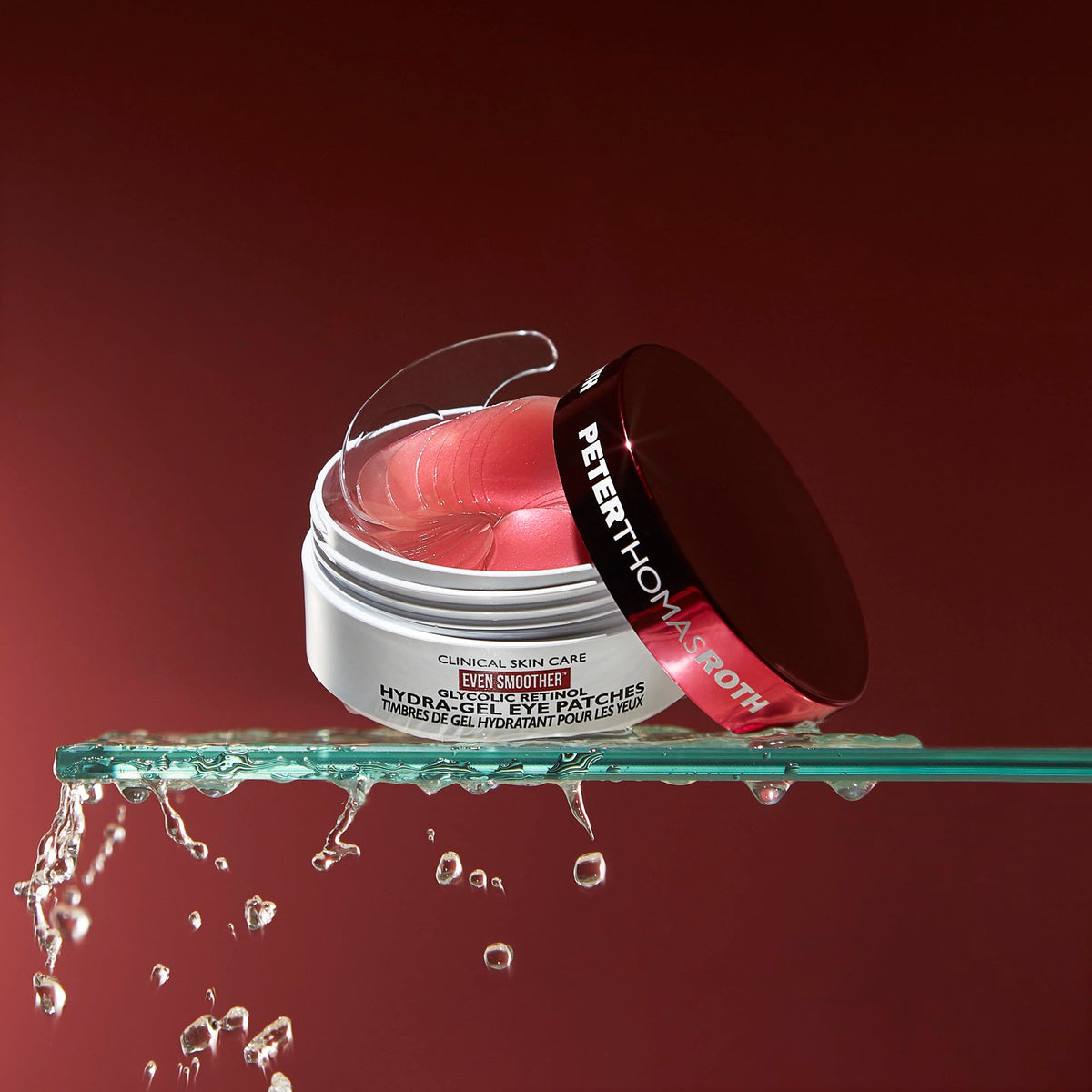 Peter Thomas Roth eye patches jar with lid removed showing contents