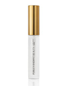 Applying Purely Radiant Beauty serum to lashes