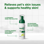Applying Douxo S3 Seb Mousse to a dog coat