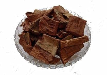 Authentic sun-dried Terminalia arjuna whole bark pieces from Sarvottam Creation displaying natural texture and premium quality.