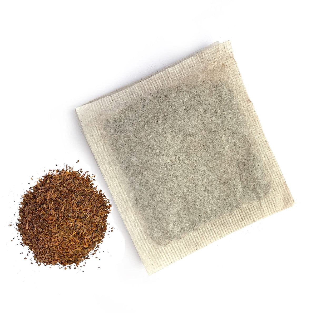 Monterey Bay Herb Co Pau D'Arco unbleached tagless tea bags pile close up view