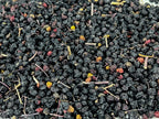 Premium USDA certified organic Sambucus nigra dried berries close up view