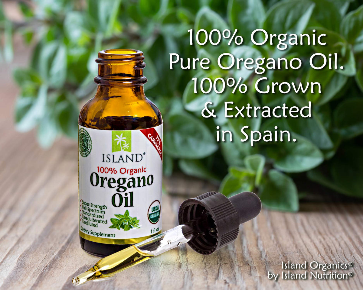 Premium 100% pure oregano oil drops showing USDA certified organic seal