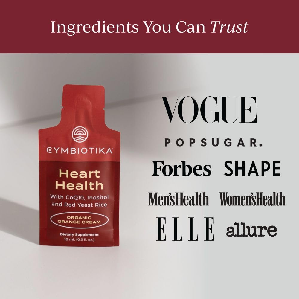 Cymbiotika Heart Health 30 serving box next to a water glass showing how to mix the liposomal formula.