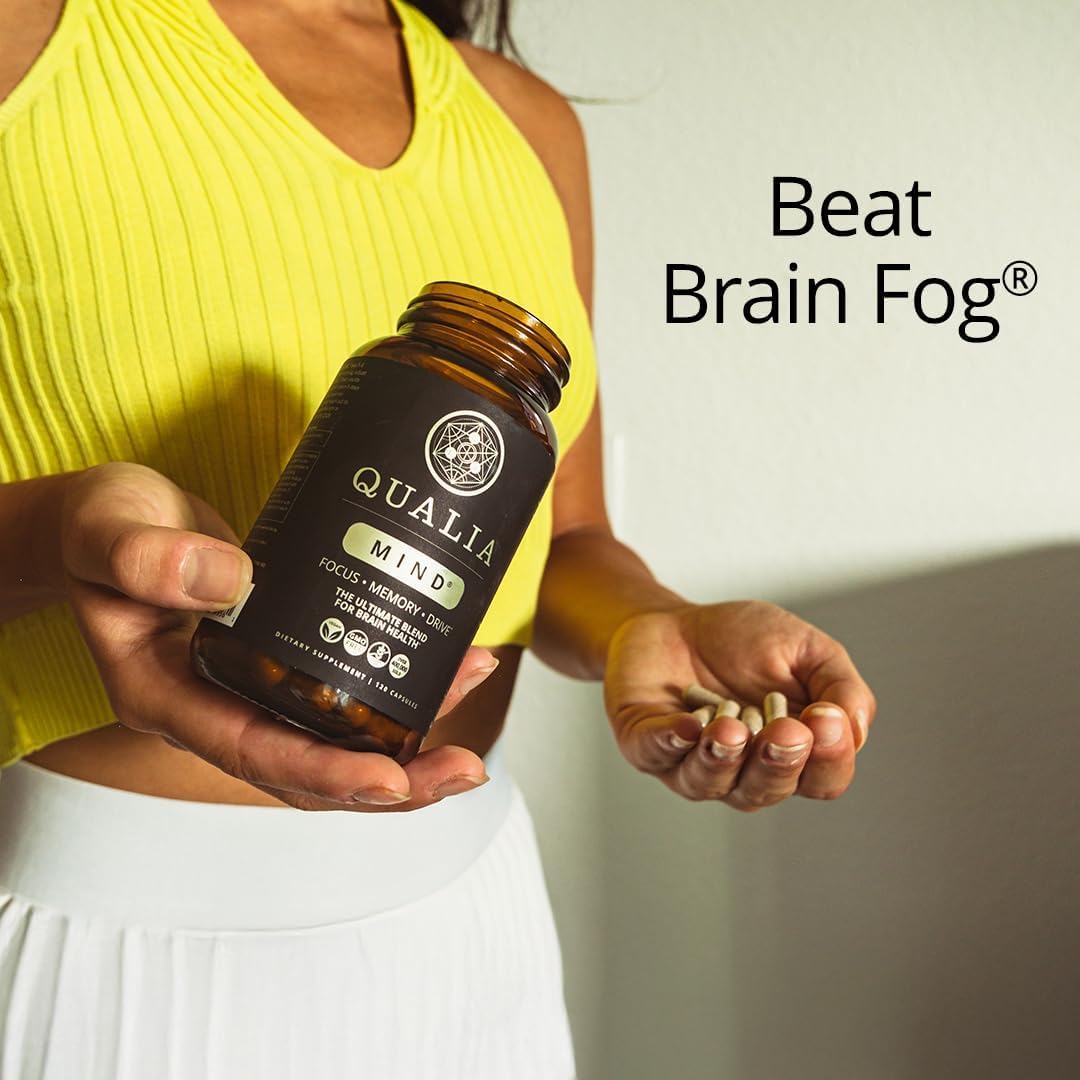 Qualia Mind nootropic matrix travel size container showing clean energy and memory enhancement labels