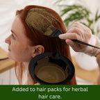Close up texture of 100 percent natural additive free green Brahmi powder.