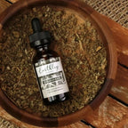 Earthley Wellness Earache Ease bottle detailing the extra virgin olive oil ingredient facts
