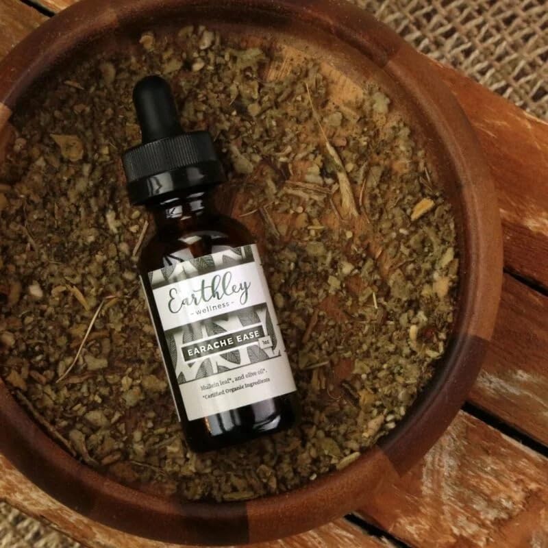 Earthley Wellness Earache Ease bottle detailing the extra virgin olive oil ingredient facts