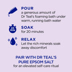 Pouring Dr Teal's foaming bath under running water to create rich lavender bubbles