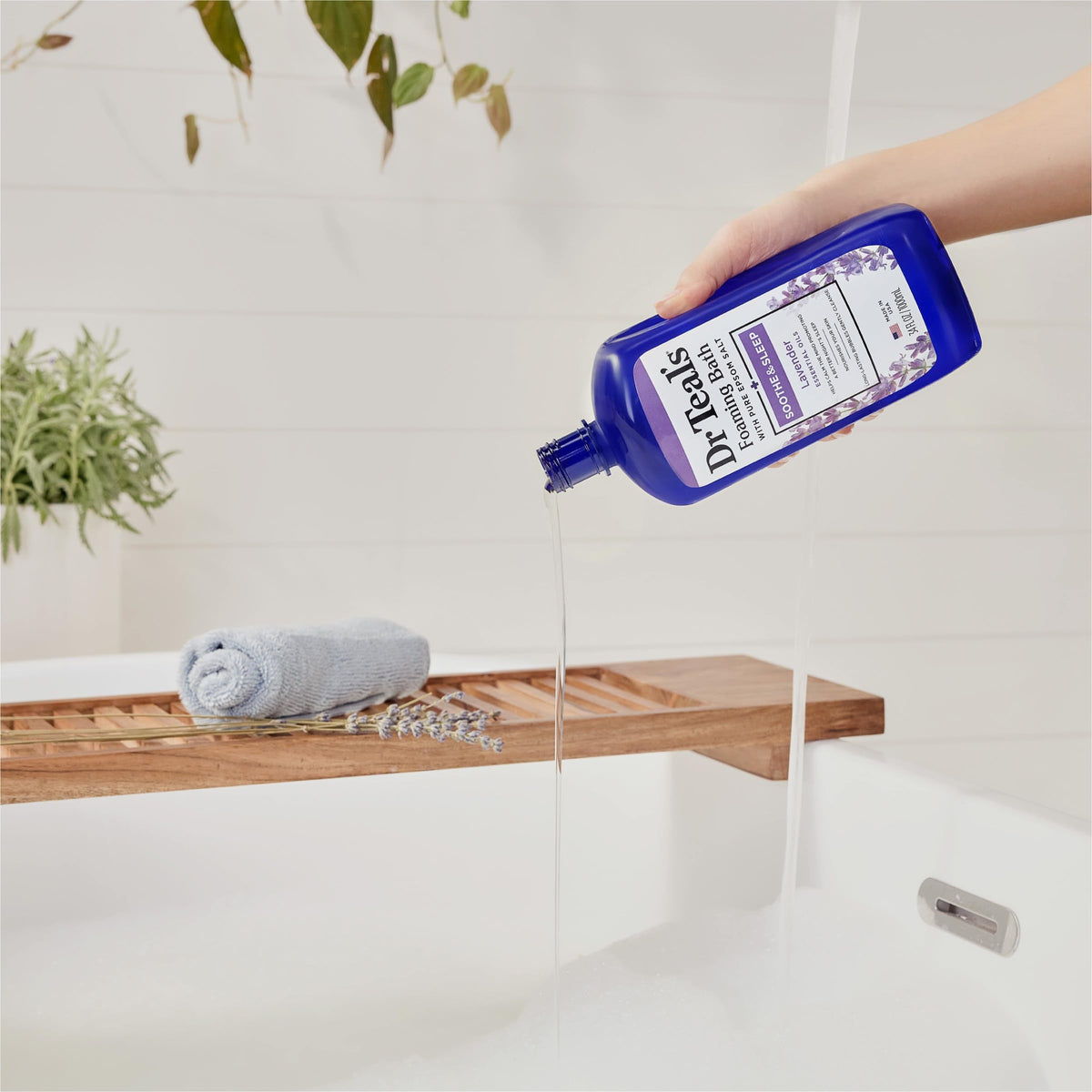 Close up of Dr Teal's lavender essential oil foaming bath text and certification seals