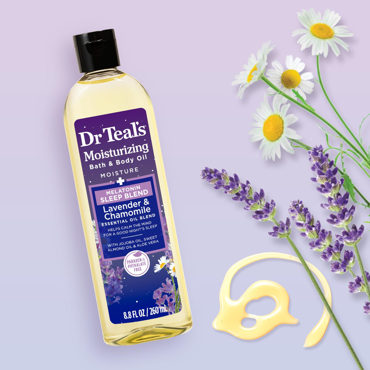 Dr Teal's lavender and chamomile body oil bottle placed in a cozy nighttime bedroom setting