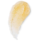 Close up view of the packaging emphasizing the paraben free and vegan features of the body scrub