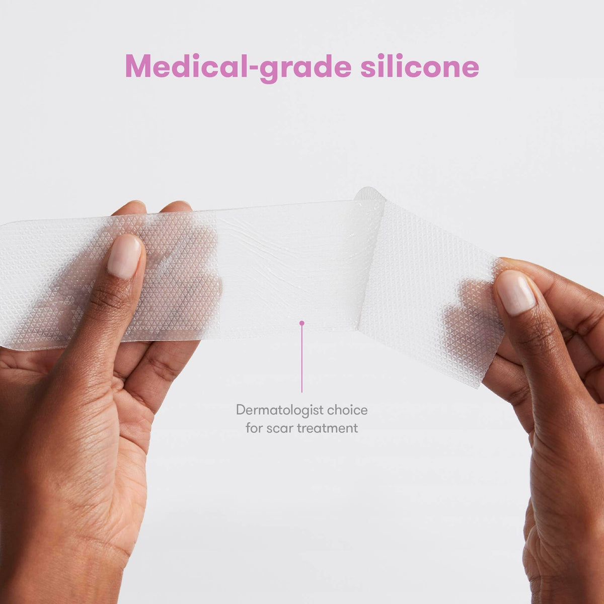 Close-up of an eight inch long transparent medical grade silicone patch designed for complete post-operative incision coverage