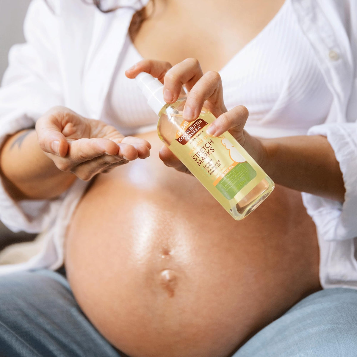 Lightweight non-greasy Palmer's stretch mark oil for expanding tummies