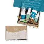 Earth Mama maternity safe skincare kit including natural belly oil and organic belly butter for stretch mark care.