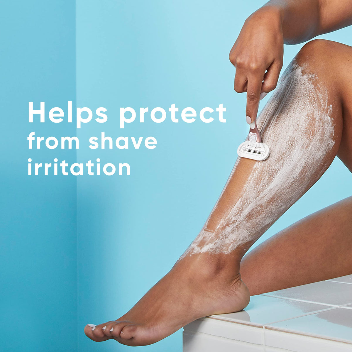 Three individual six ounce tubes of Gillette Venus moisturizing shave cream with aloe and shea butter standing upright