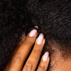 Authentic Cliganic pure vitamin E oil dropped on skin showing rich concentrated texture