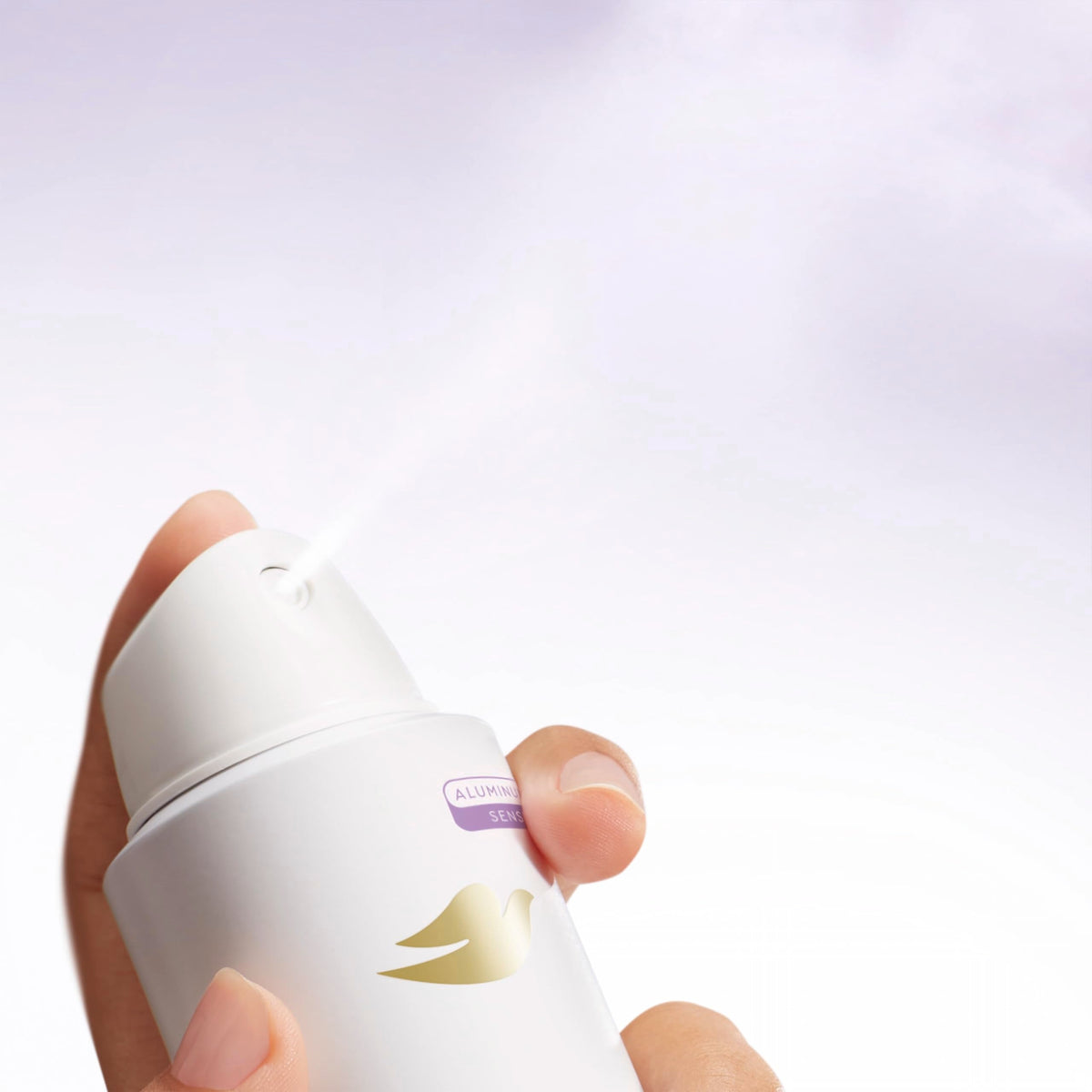 Close up of Dove aluminum free spray nozzle application