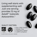 Single red carotenoid softgel capsule from Sports Research Astaxanthin bottle for daily skin and eye support.
