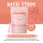 Slumbr pink nighttime nasal strips being applied to a female nose bridge for snoring relief.