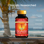Nutrex Hawaii BioAstin antioxidant softgels poured out highlighting the dark red color