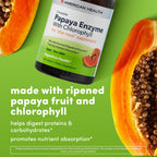 Close up of the chewable papaya enzyme tablets with chlorophyll highlighting the natural green speckled formulation.