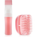 Generic scalp oil applicator bottle front view showing the pink silicone body and white root comb teeth.